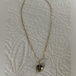 Waxing poetic gold chain and heart/cross pendant